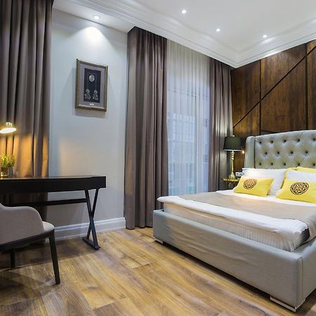 Qonaq Hotel Astana Extérieur photo
