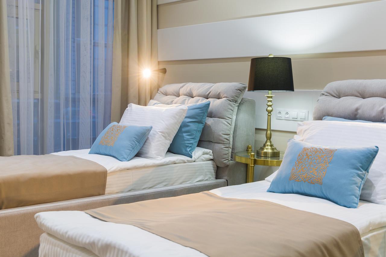 Qonaq Hotel Astana Extérieur photo