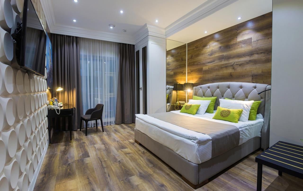 Qonaq Hotel Astana Extérieur photo