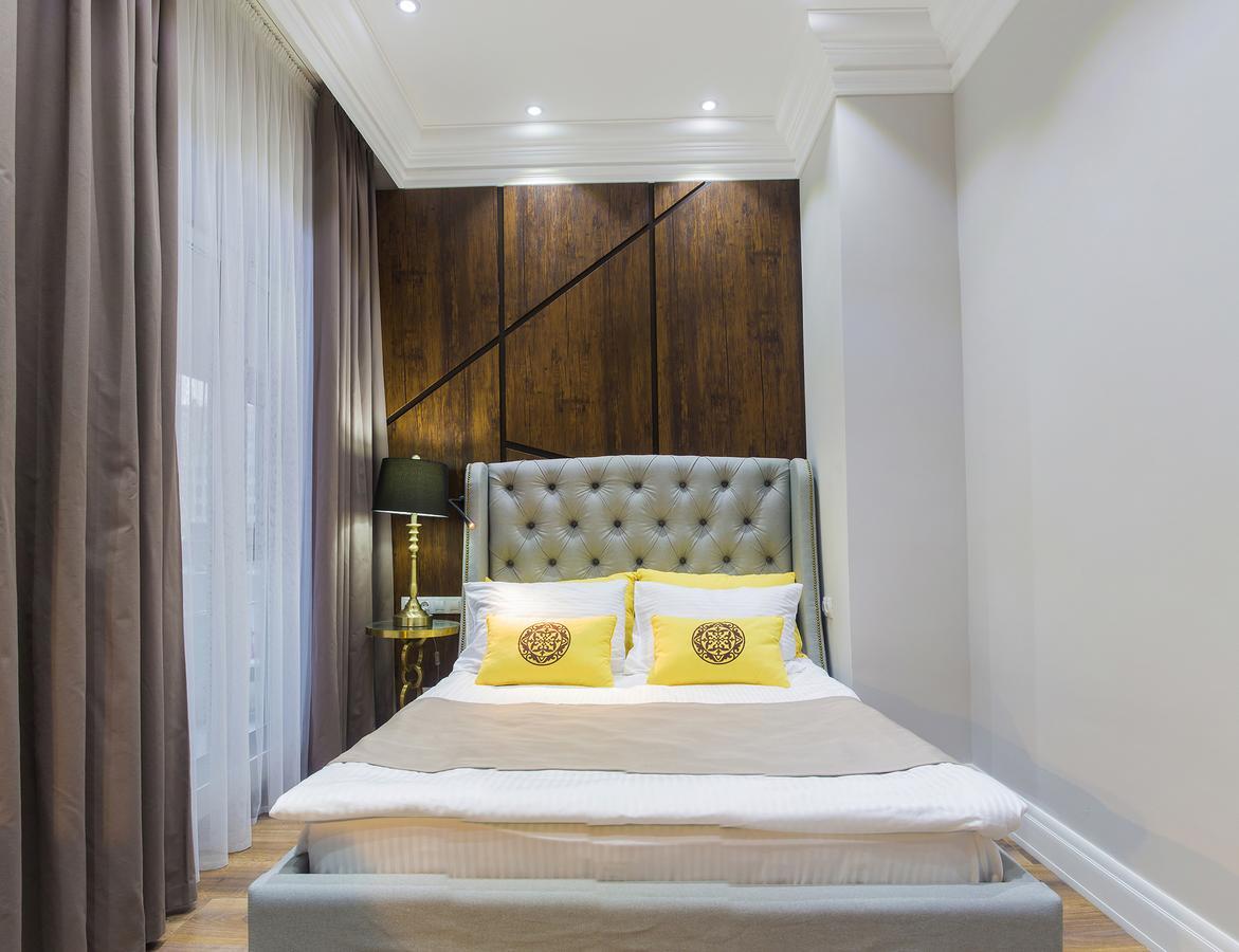 Qonaq Hotel Astana Extérieur photo